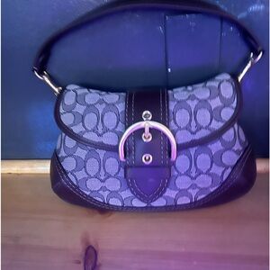 It’s a beautiful small 100% authentic coach bag